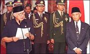 180px-Suharto_resigns